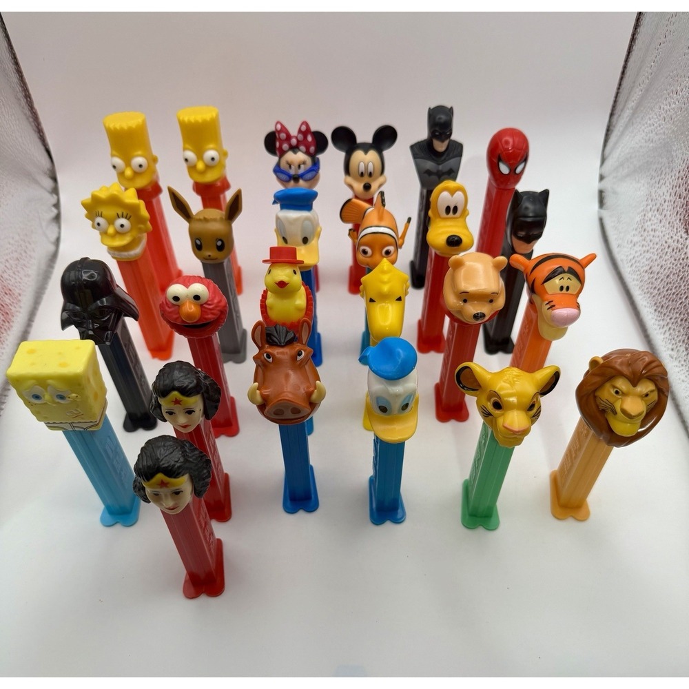Lot of 24 PEZ Dispensers Disney Simpsons Marvel DC Star Wars Sesame Street